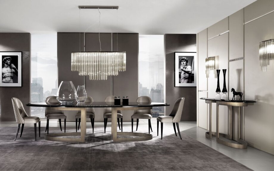 Form Prince стол | DV home. Изысканный обеденный стол в стиле ар-деко с изогнутым основанием из нержавеющей стали и роскошной столешницей из лака или шпона.
