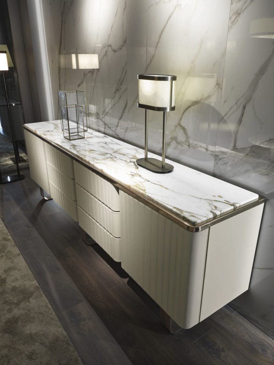 Elite комод | DV home. Роскошный буфет в стиле ар-деко с кожаными или лакированными фасадами, столешницей из мрамора или ореха Каналетто и полированными стальными акцентами.
