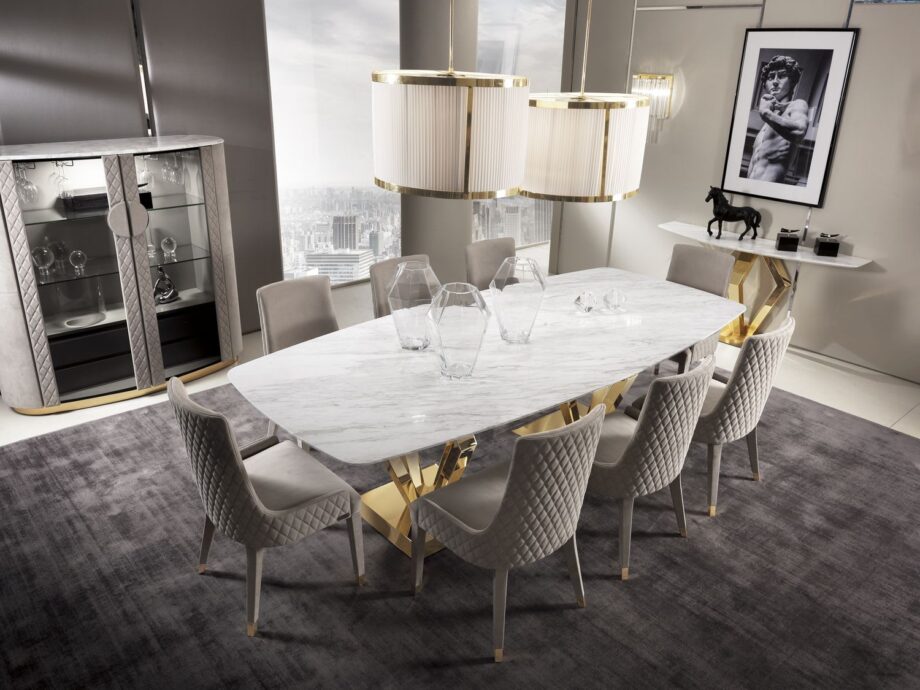 Ritz стол | DV home. Изысканный обеденный стол в стиле ар-деко с геометрическим металлическим основанием и роскошной мраморной или деревянной столешницей.